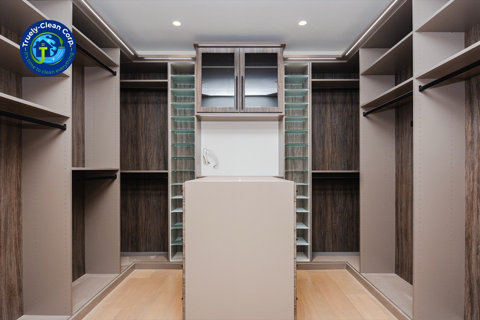 Empty custom walk-in closet cleaned down to bare shelving before move-in